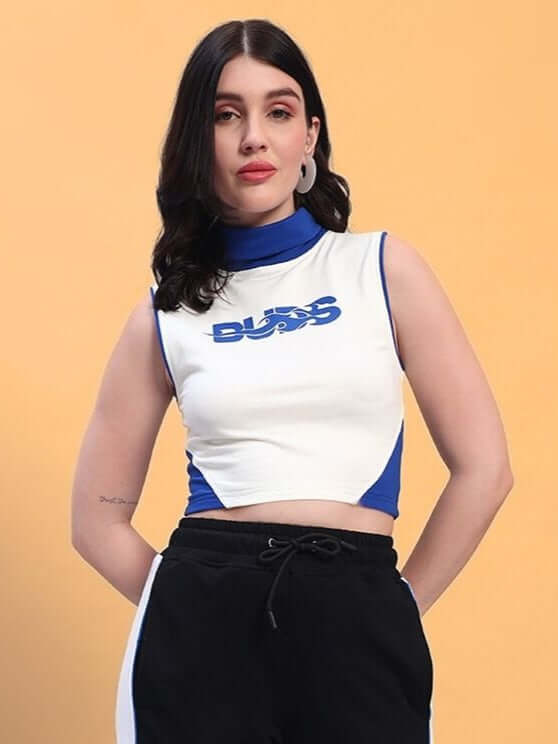 Model wearing a white women's crop-top with blue accents, made from premium cotton French Terry Lycra, featuring a modern design.