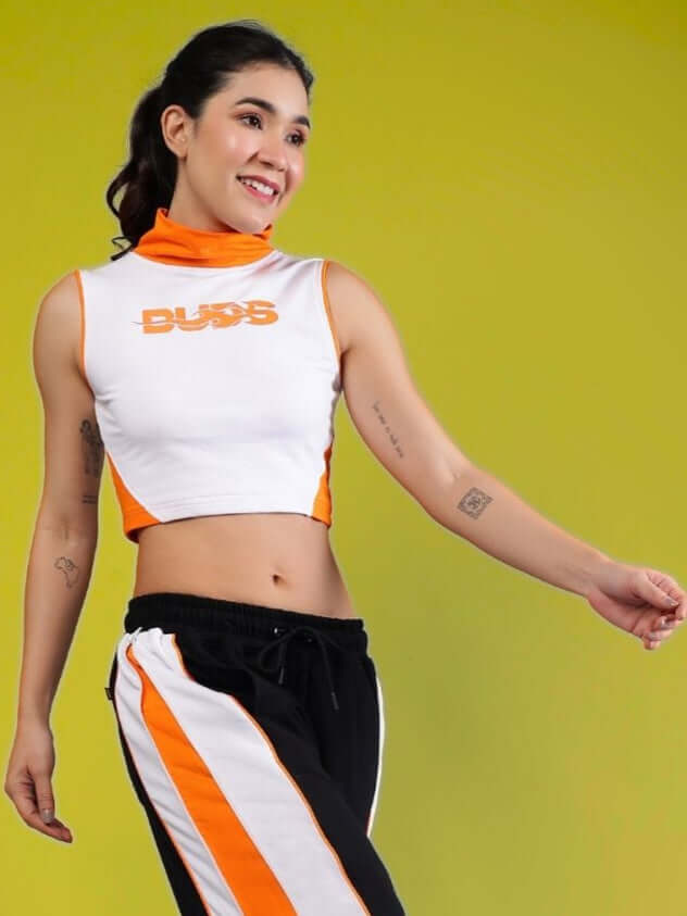 Woman wearing Women's MYSKY crop-top in white and orange, made from premium cotton terry with Lycra, stylish and comfortable fit.