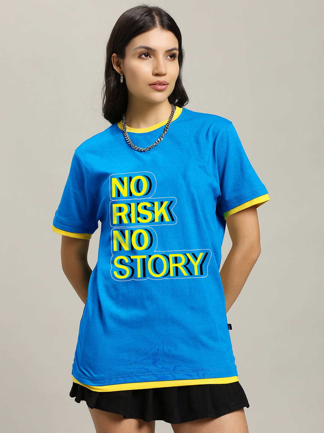 Woman wearing blue regular fit t-shirt with 'No Risk No Story' text, made from 100% cotton, ideal for casual wear.