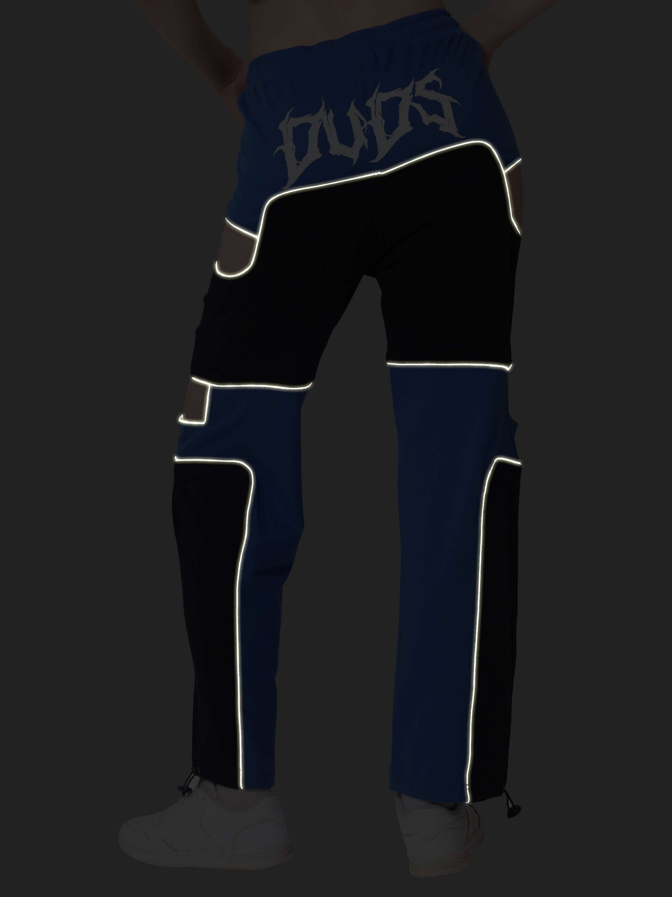 Women's Oddy Co-Ord Set in blue with reflector details, made from 100% premium cotton. Illustration of pants rear view.