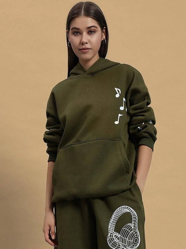 Woman wearing WOMEN OPERA FLEECE HOODIE OLIVE GREEN with musical designs