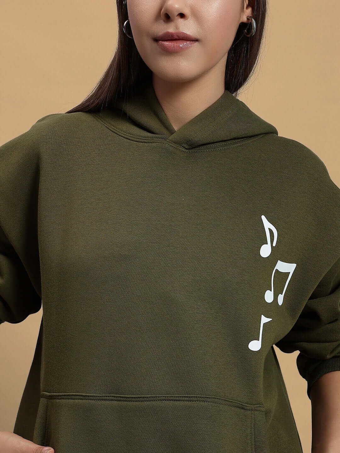 Stylish WOMEN OPERA FLEECE HOODIE OLIVE GREEN with musical note design, perfect for a made-to-order cozy fit by skilled DUDS tailors.