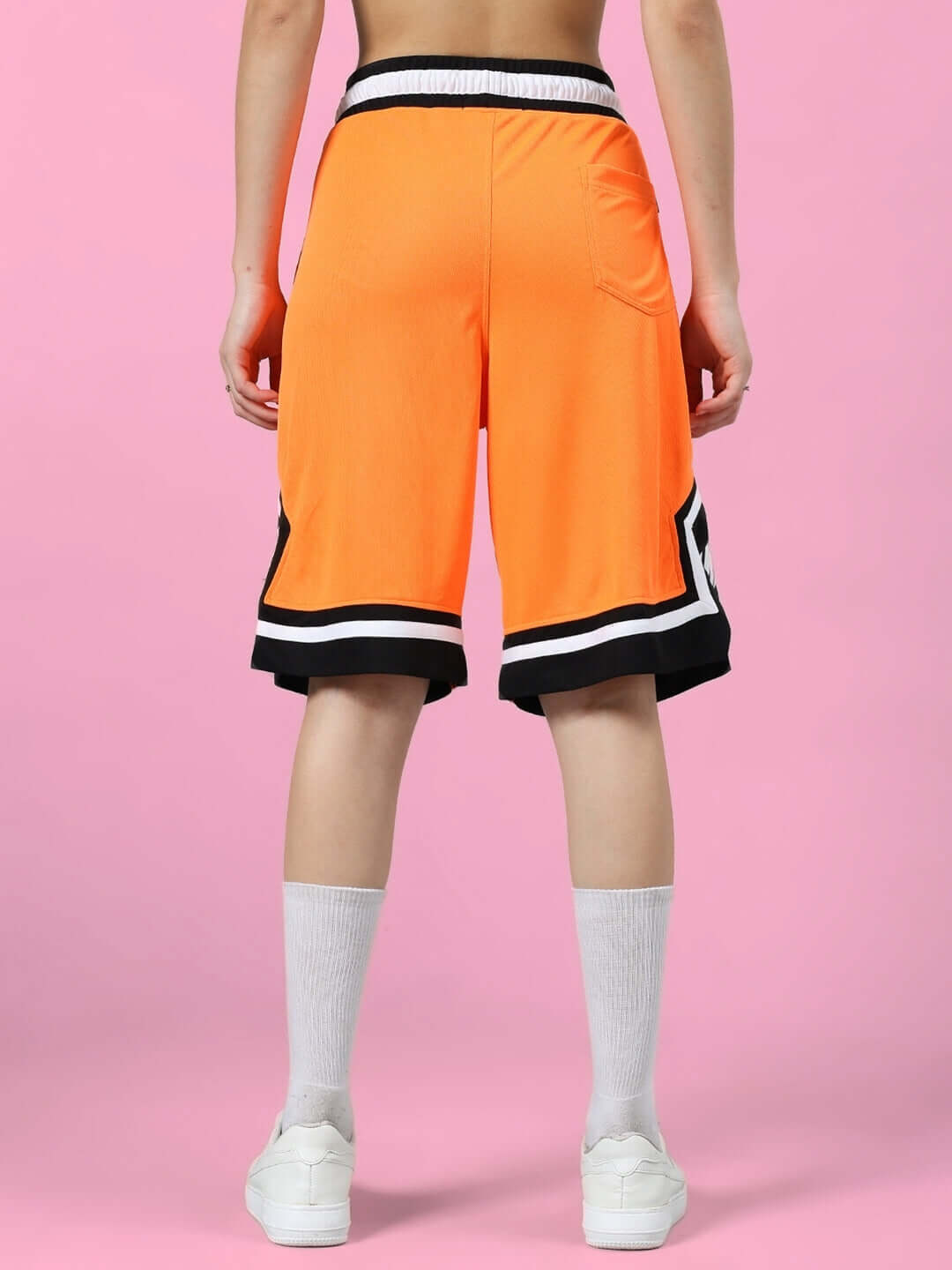 Back view of WOMEN'S FRANKY GYM CO-ORD SET ORANGE BLACK shorts in sports polyester fabric.