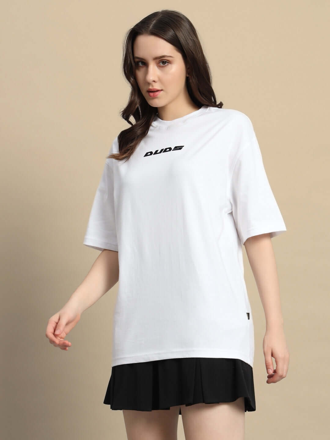 Luxury white oversized t-shirt for women, made of premium cotton French terry, featuring a bold print on the front.