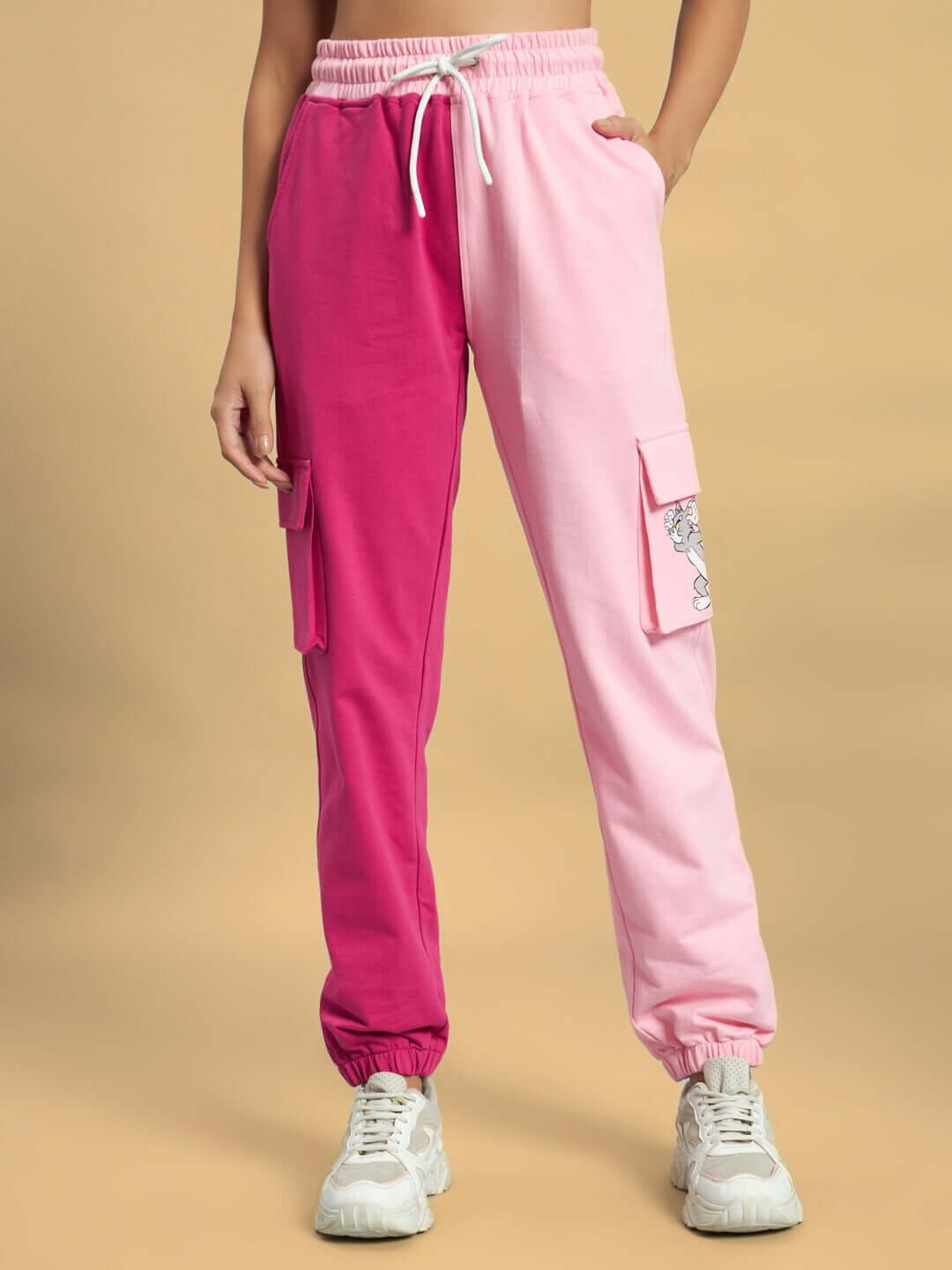 Pink and fuchsia women's co-ord set pants with pockets, featuring premium cotton French terry lycra blend, displayed on model.