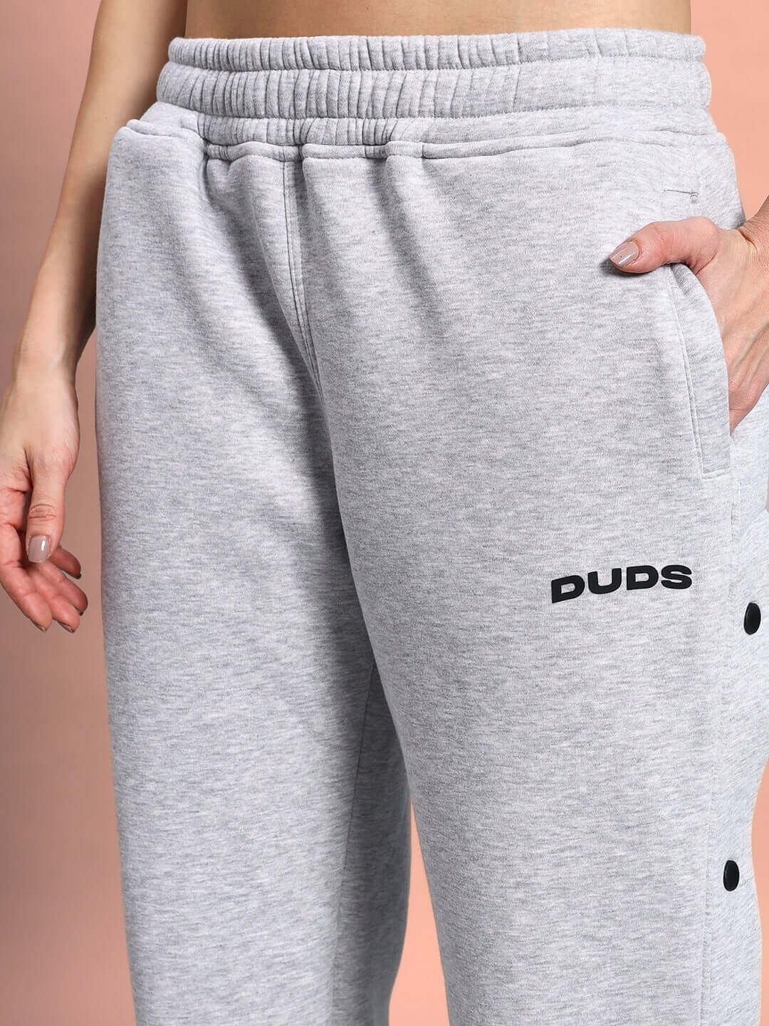 Women's polar fleece jogger in grey by DUDS, showcasing comfortable fit and design details.