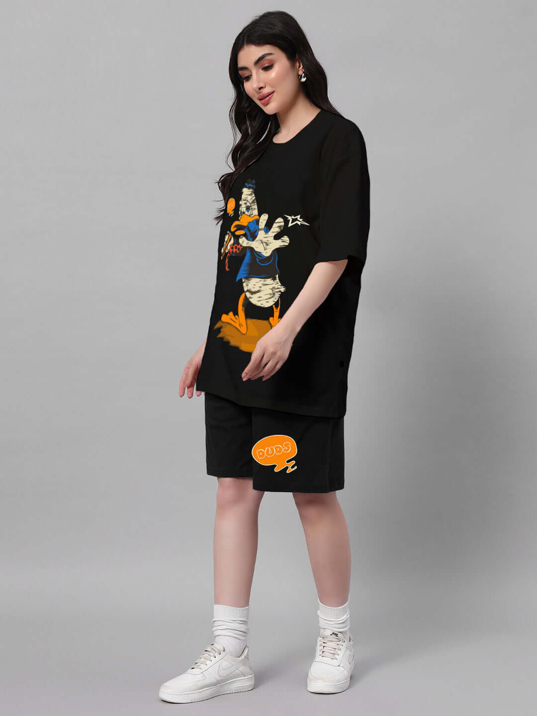 Model wearing Women's Quack Off Co-ord Set in black, featuring printed graphics, made from premium cotton French terry lycra. Available in various sizes.