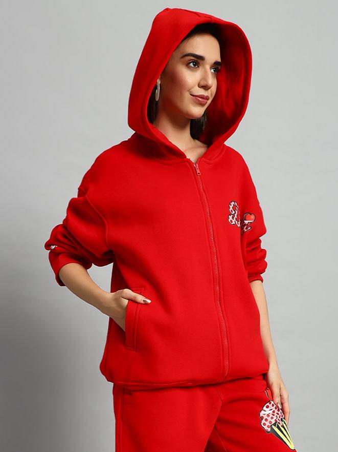 Woman wearing WOMEN CUPCAKE FLEECE HOODIE RED with hood up, showcasing cozy streetwear style.