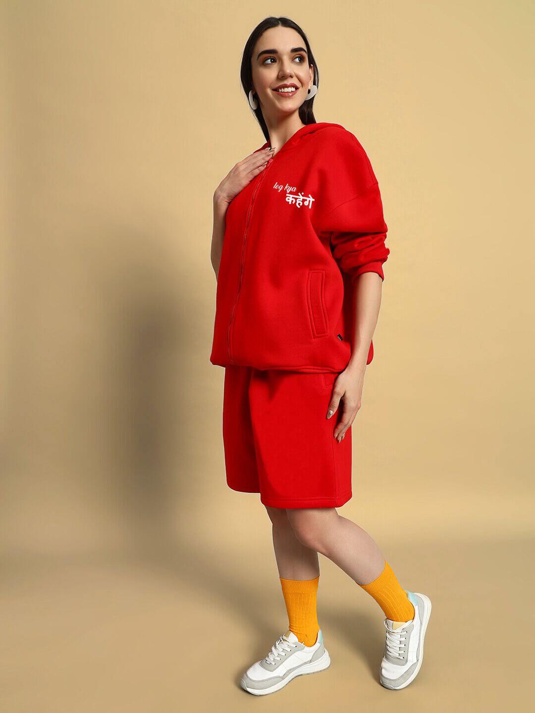 Woman wearing WOMENS A LOOK ATTITUDE FLEECE CO-ORD RED outfit, showcasing bold, vibrant street-style fashion with comfortable fleece.