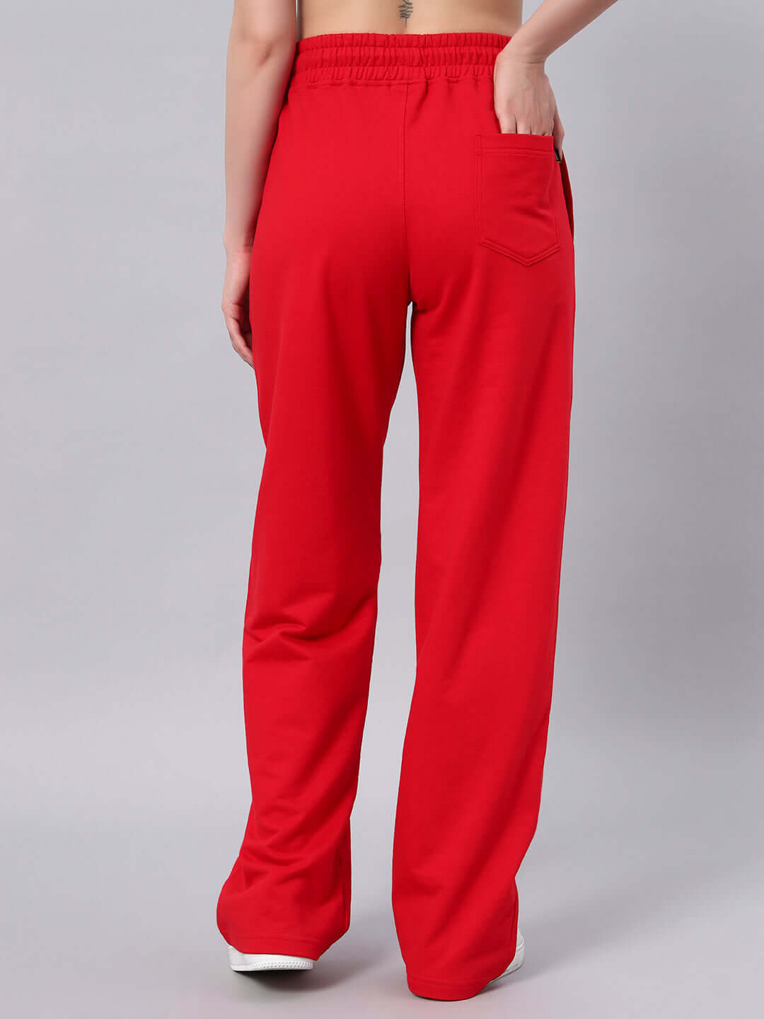 Back view of the WOMEN'S REDX BRANCHING JOGGER RED, showing elastic waistband and pocket detail.