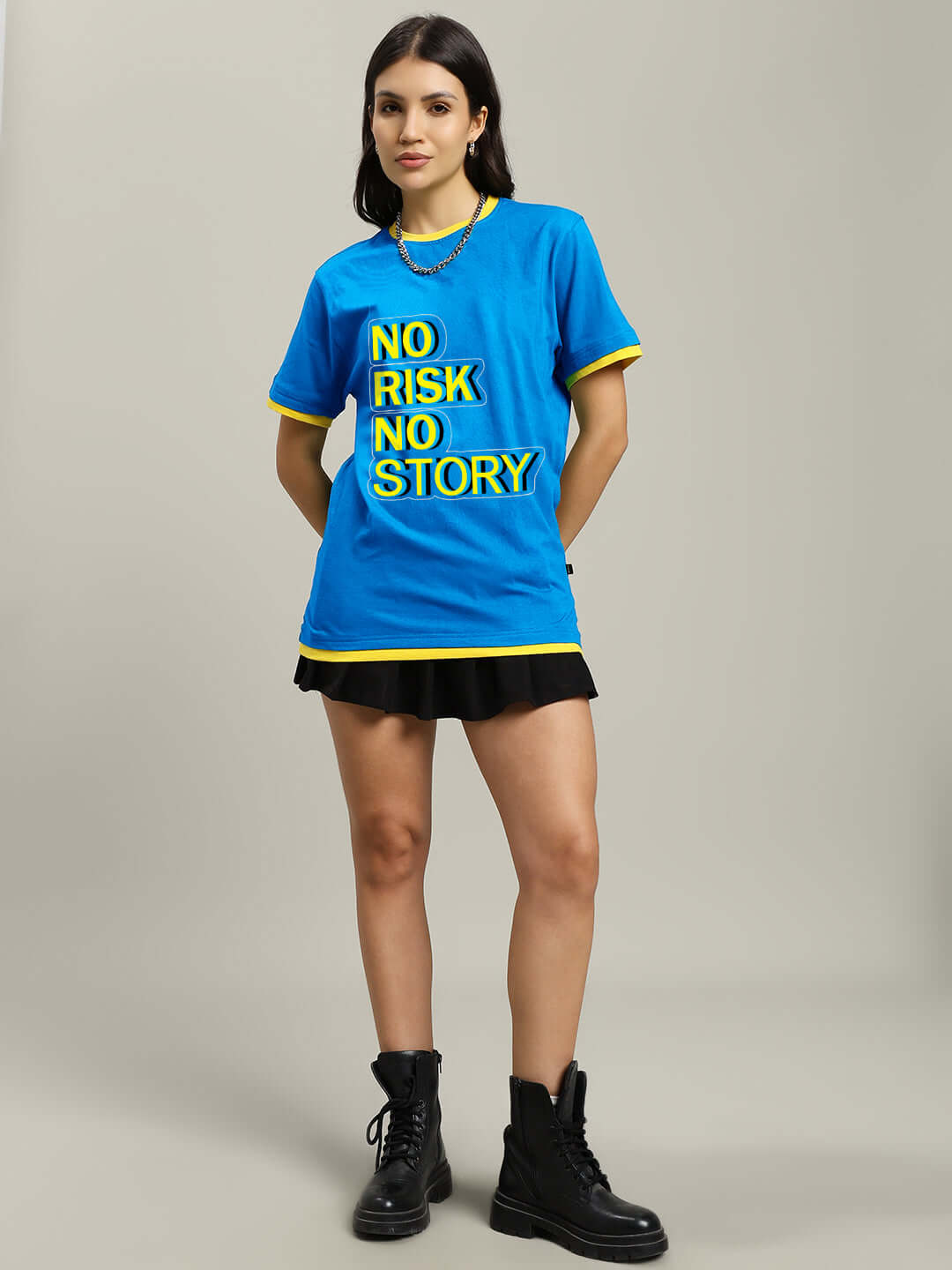 Model wearing Women's No Risk Regular Fit Blue T-Shirt, premium 100% cotton, standing in boots, highlights casual style and comfort.