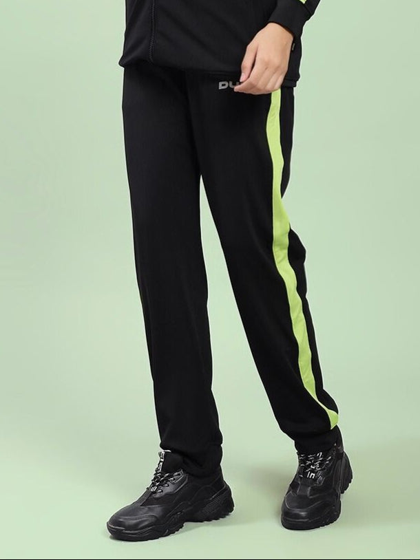 WOMEN'S HIGH PERFORMANCE RELAXED FIT JOGGER BLACK with neon stripe, showcasing comfort and style in moisture-wicking fabric.