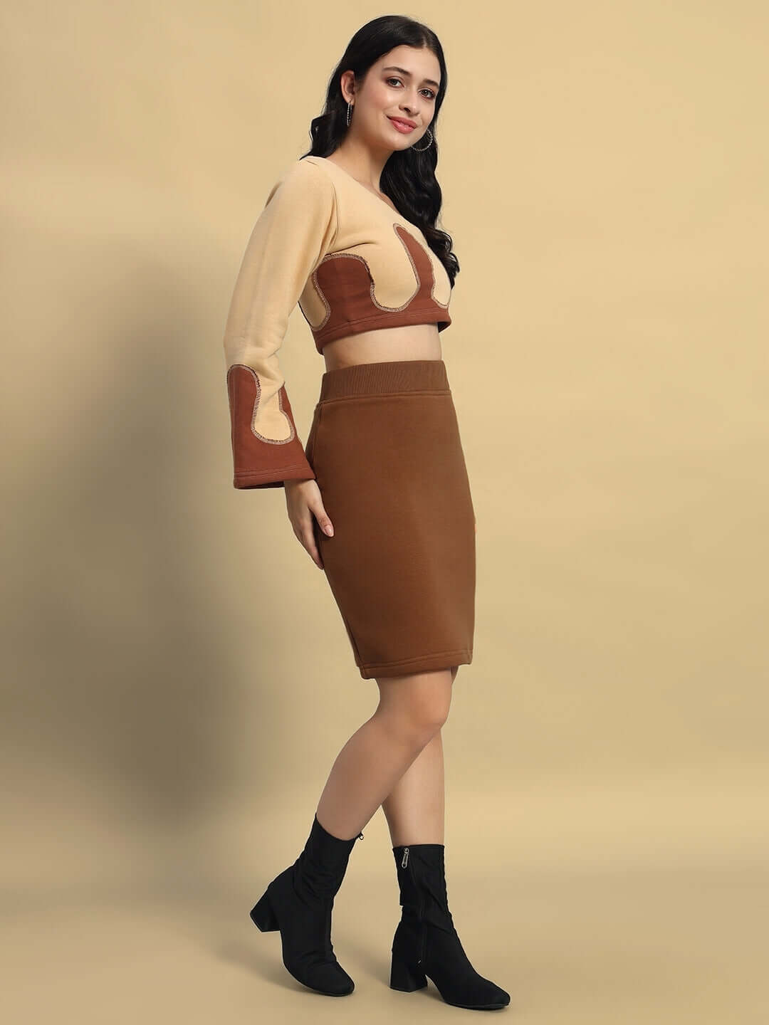 Model wearing WOMEN'S RETRO CO-ORD SET BEIGE BROWN with premium heavy gauge fabric and cotton fleece, styled for modern elegance.
