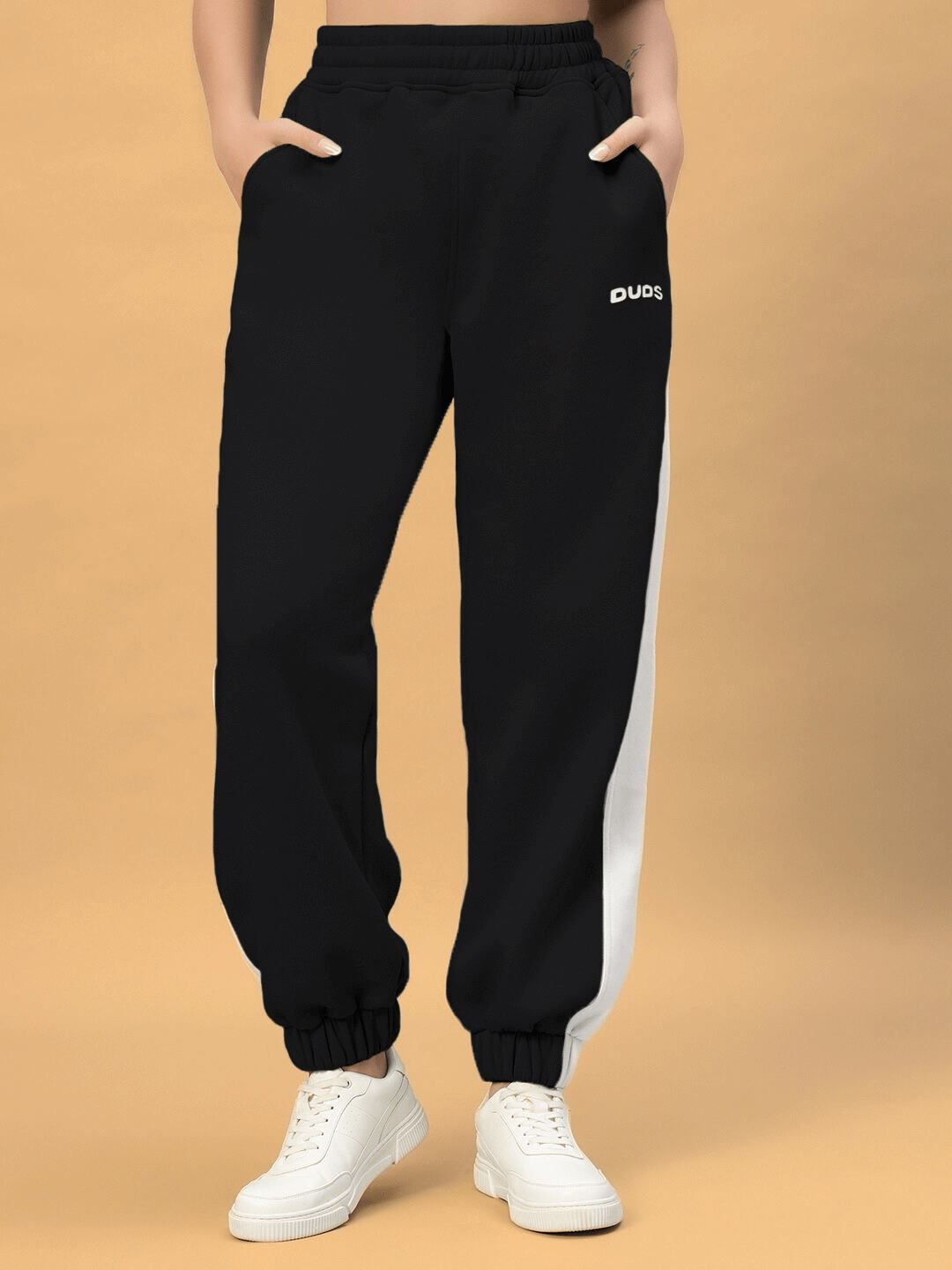 Women's Rizzler colorblock black co-ord pants by DUDS, featuring white side stripe, customizable size option available.