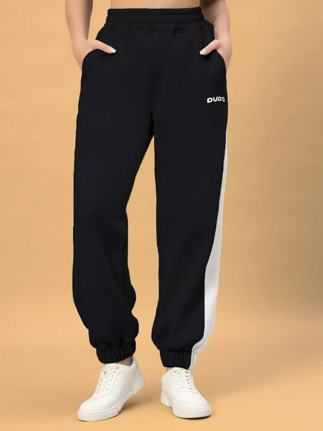 WOMEN RIZZLER FLEECE COLORBLOCK JOGGER BLACK featuring premium fleece fabric and modern colorblock design for a stylish look.
