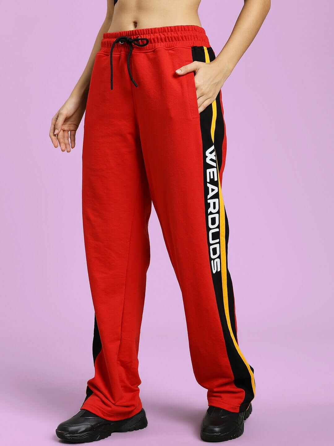 Red relaxed-fit women's joggers by DUDS with black side stripes and customizable size option.