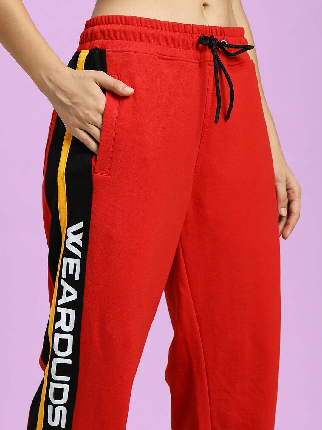 WOMEN'S ROGER RELAXED-FIT JOGGERS RED with side stripe and drawstring waist, perfect for casual wear.
