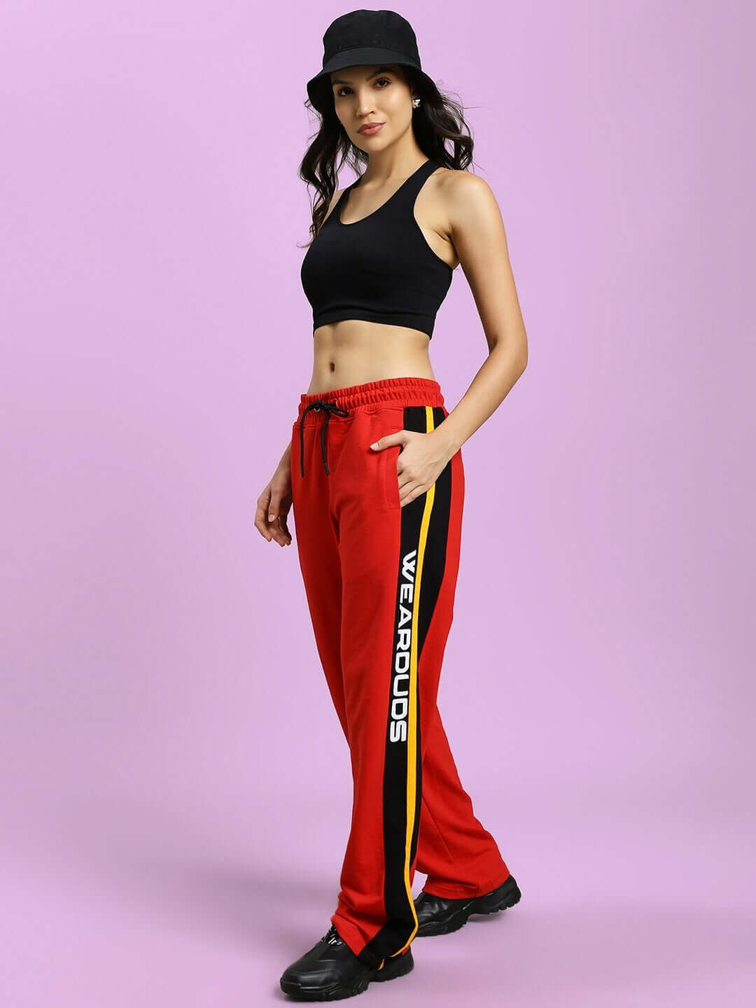 Woman wearing WOMEN'S ROGER RELAXED-FIT JOGGERS RED by WearDuds.