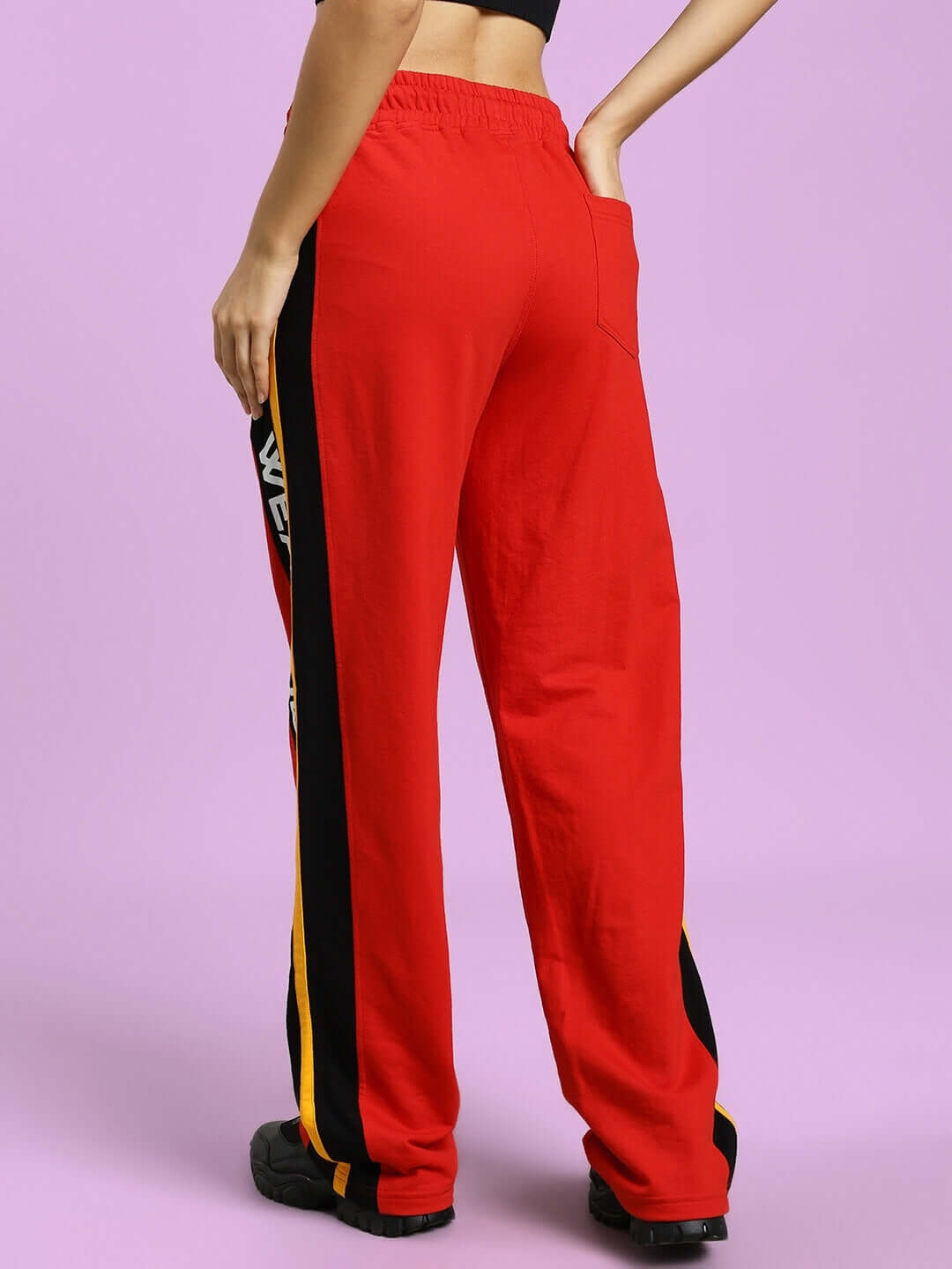 Back view of Women's Roger Relaxed-Fit Joggers in red, featuring a stylish side stripe detail, perfect for casual wear and custom fit options.
