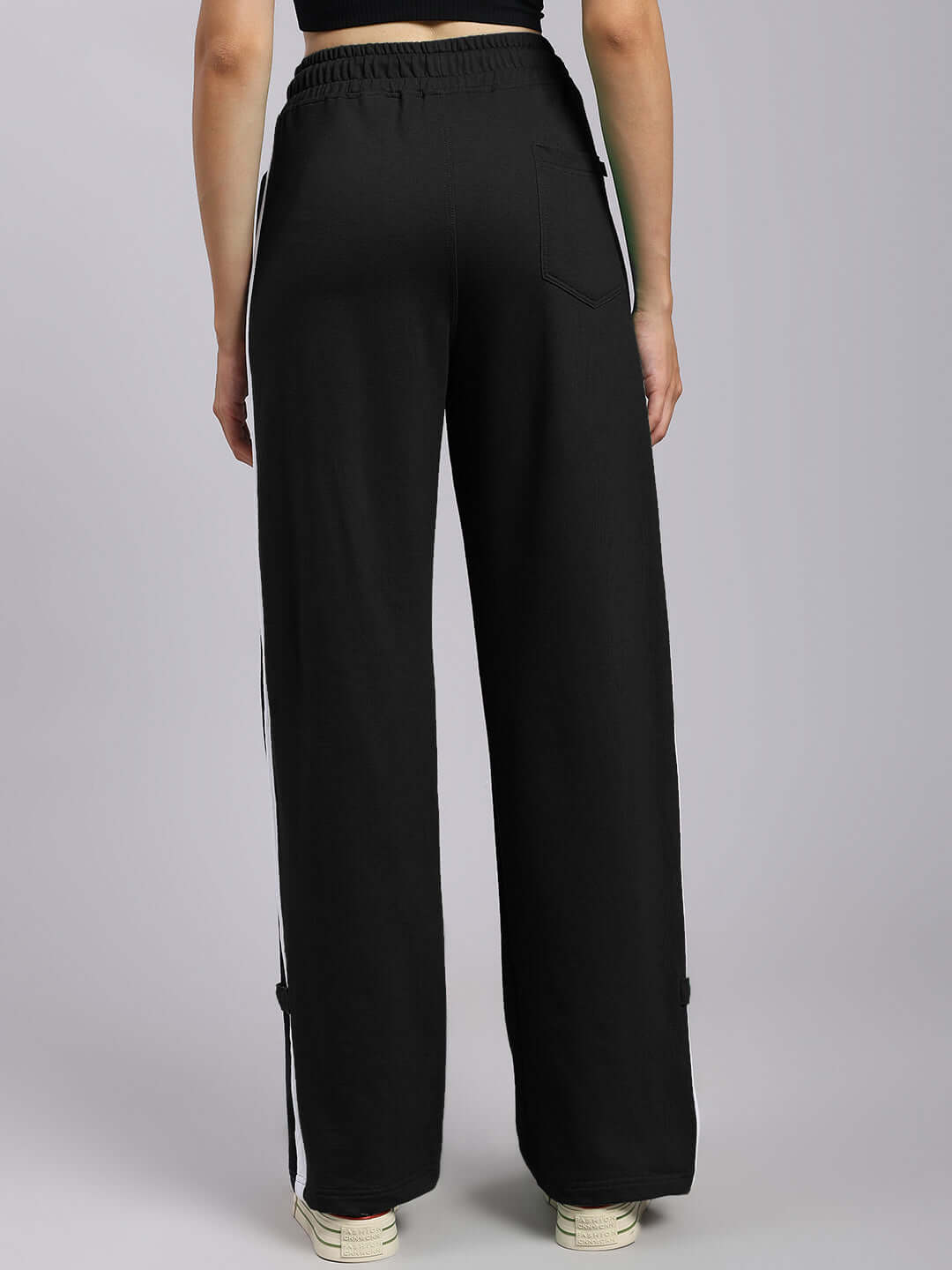 Women's black Rosston relaxed fit joggers, back view showcasing elastic waistband and wide leg design.