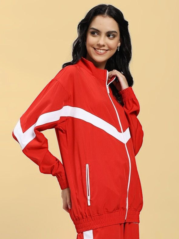Woman wearing WOMEN'S ROYAL COMFORT RELAXED FIT JACKET RED with white stripes, showcasing the casual and stylish design for everyday wear.