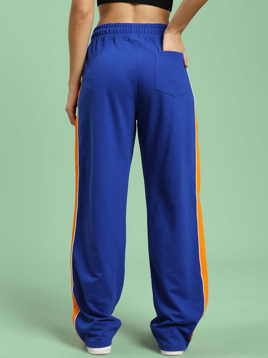 Back view of WOMEN'S SANFORD STRIPE JOGGERS BLUE with orange stripe detail.