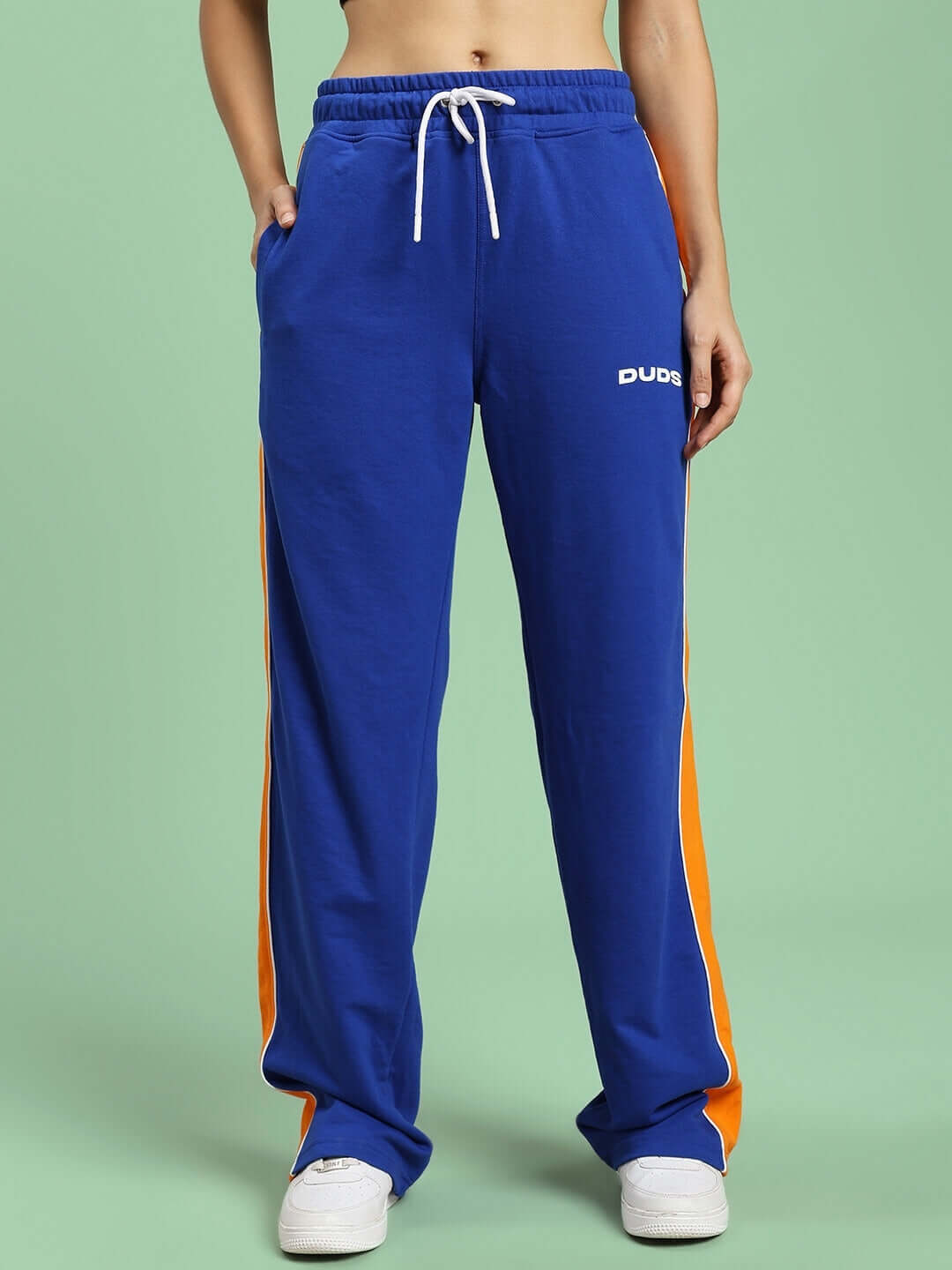 Women's blue Sanford Stripe Joggers by DUDS with orange side stripes and customizable fit options.
