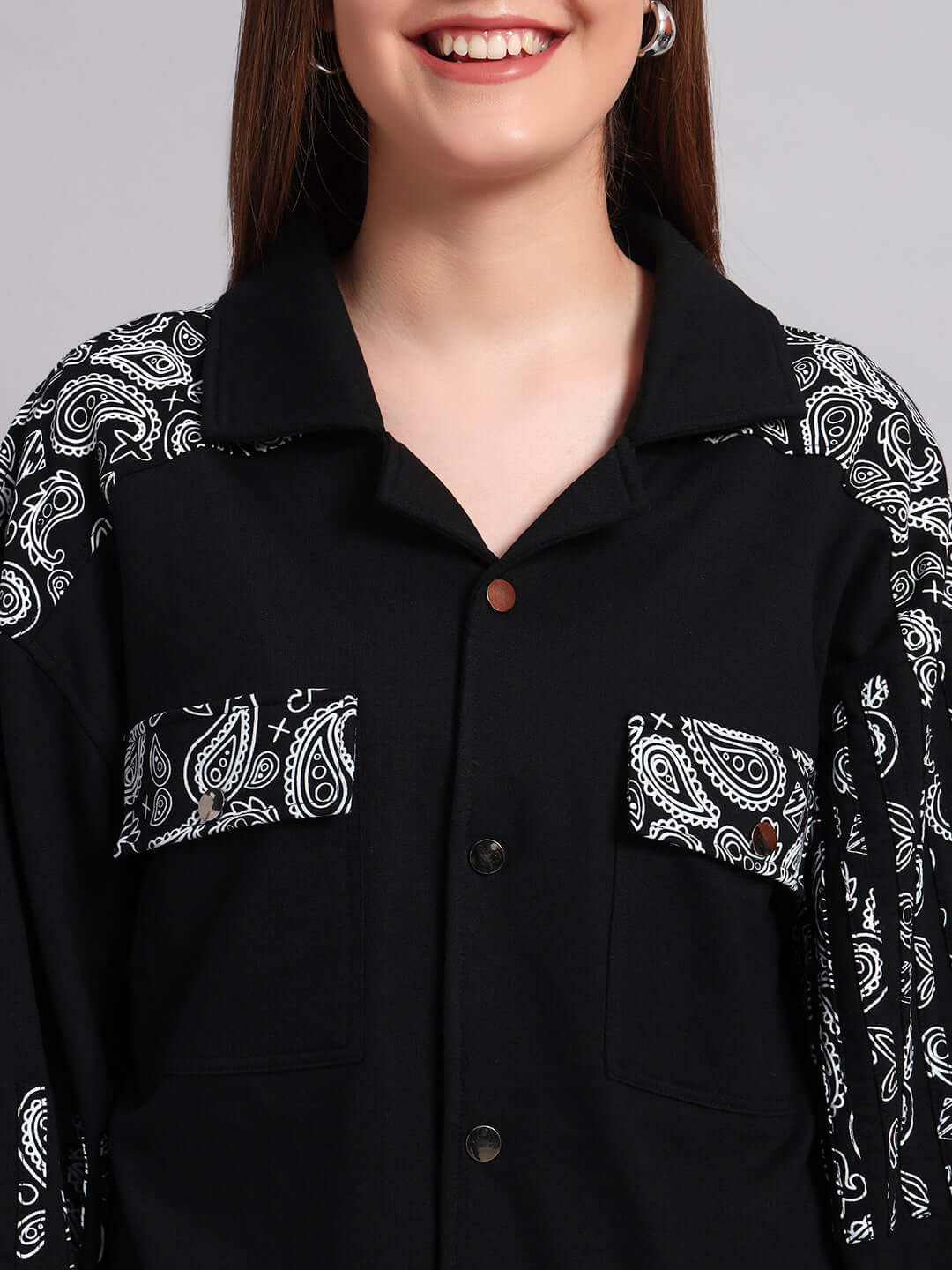 Black Sanganeri co-ord set with paisley design, 100% cotton, bio-washed, showcasing front pockets and button details.