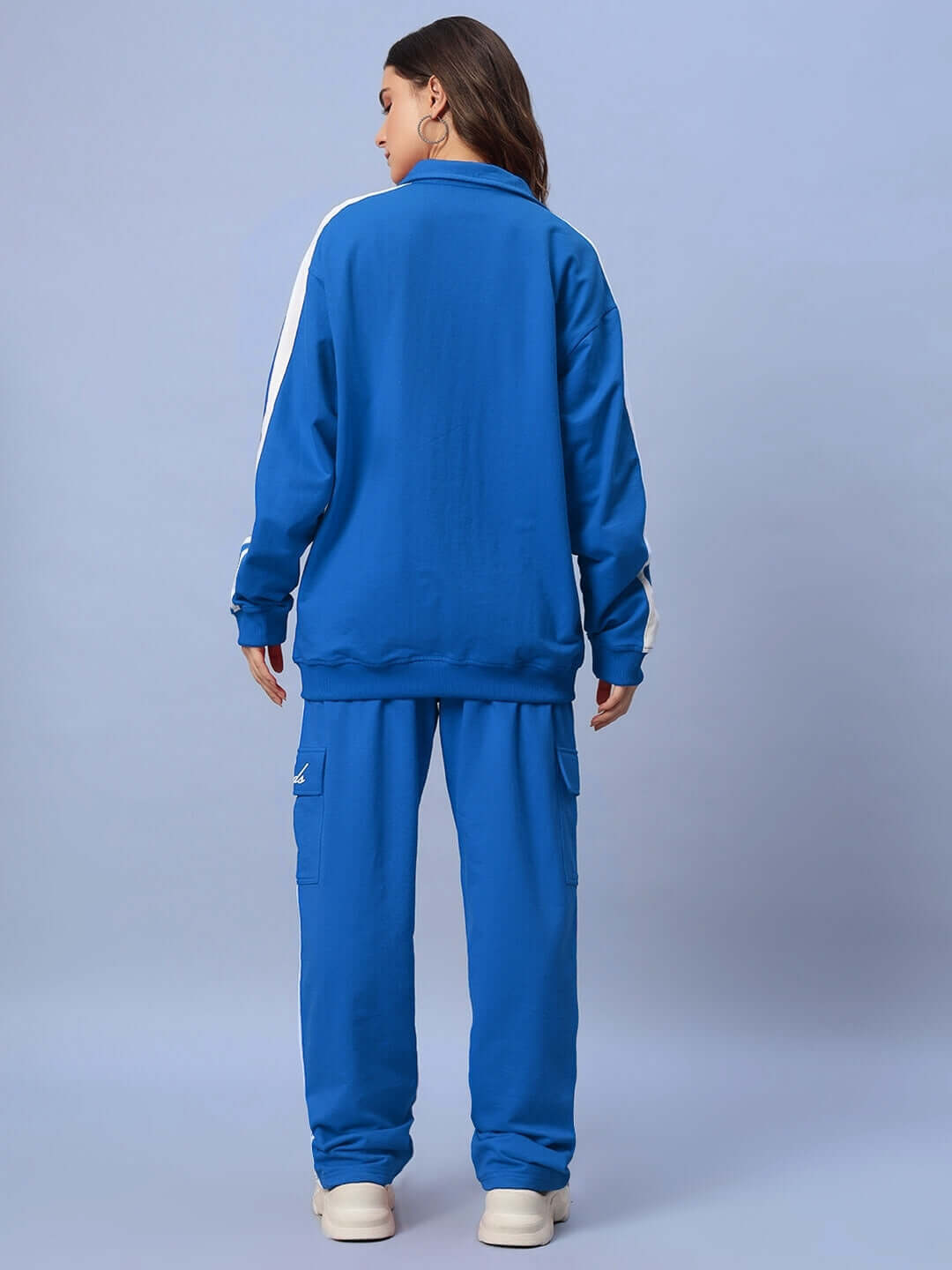 Back view of a woman wearing a royal blue WOMEN'S SCOTIA CO-ORD SET made of 100% cotton terry fabric.