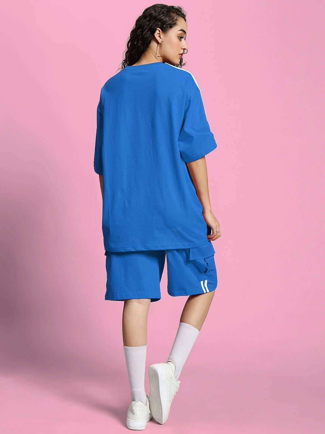 Model wearing WOMEN'S SCOTIA SUMMER CO-ORD SET ROYAL BLUE, showcasing stylish and comfortable design for warm-weather streetwear.