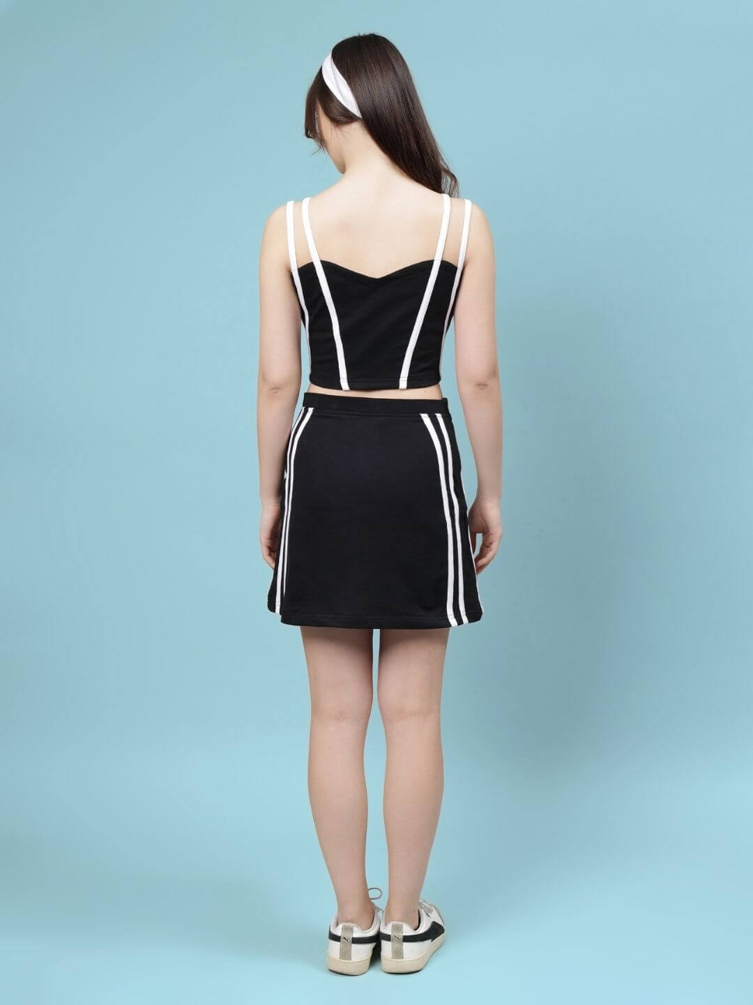 Back view of Women's Simone Co-Ord Set in black, featuring premium cotton fabric, showcasing stylish design with white accents.