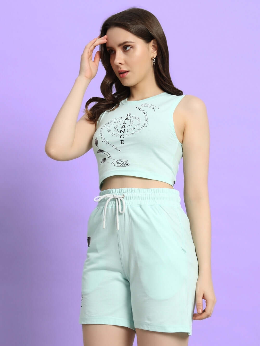 Women's sky blue balance co-ord set with print, made from premium cotton terry lycra, featuring a sleeveless top and elastic waist shorts.