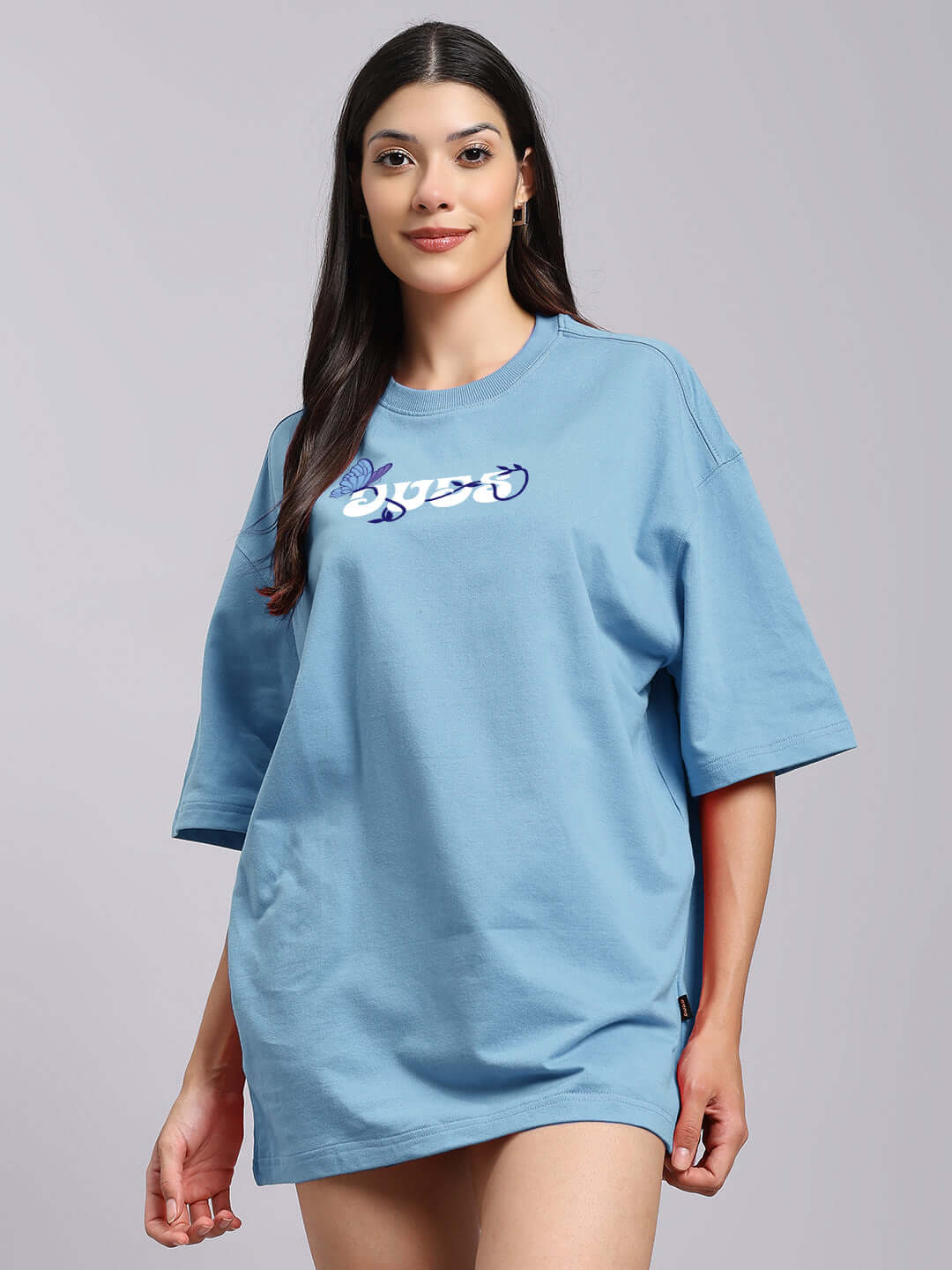 Woman wearing sky blue printed t-shirt featuring premium cotton fabric; ideal for casual wear. Manufactured in India by Color By Colours.