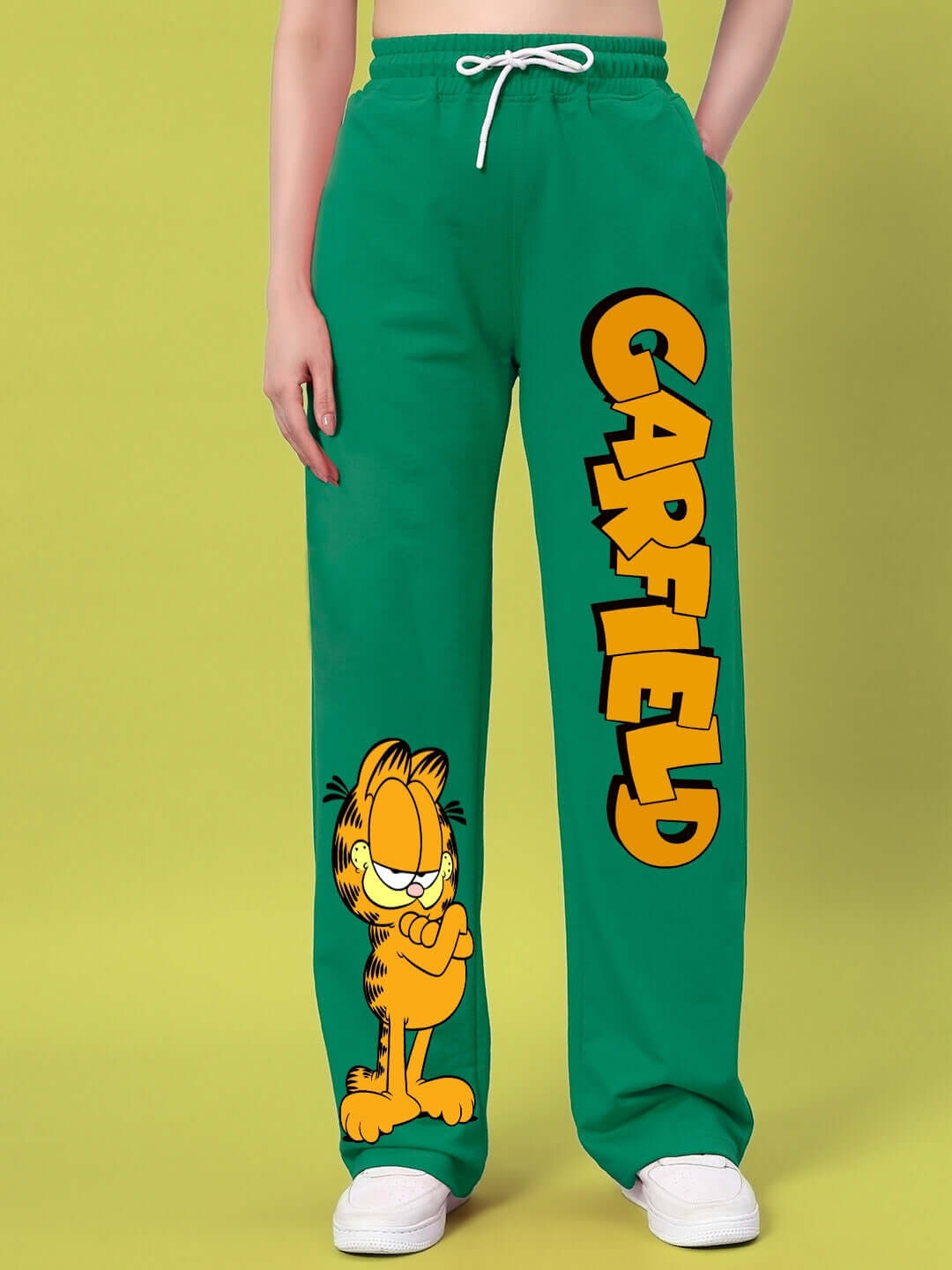 Women's green jogger pants featuring Garfield graphic and logo, relaxed fit, made to order, customizable size options available.