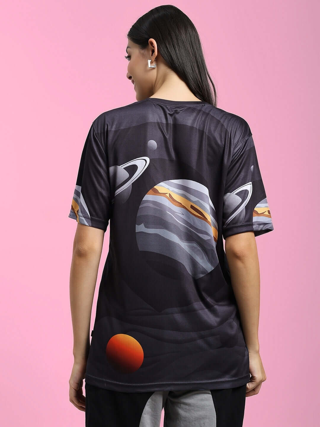Back view of women's black space fantasy printed t-shirt with planets design, made from sports polyester fabric.