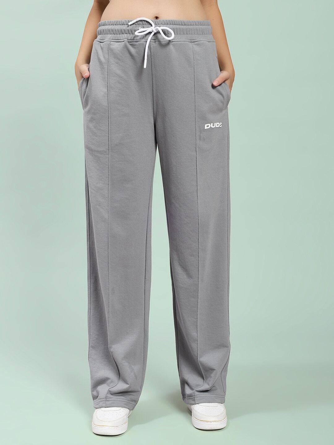 Front view of WOMEN'S SPIRAL RELAXED-FIT JOGGERS GREY with elastic waistband and side pockets