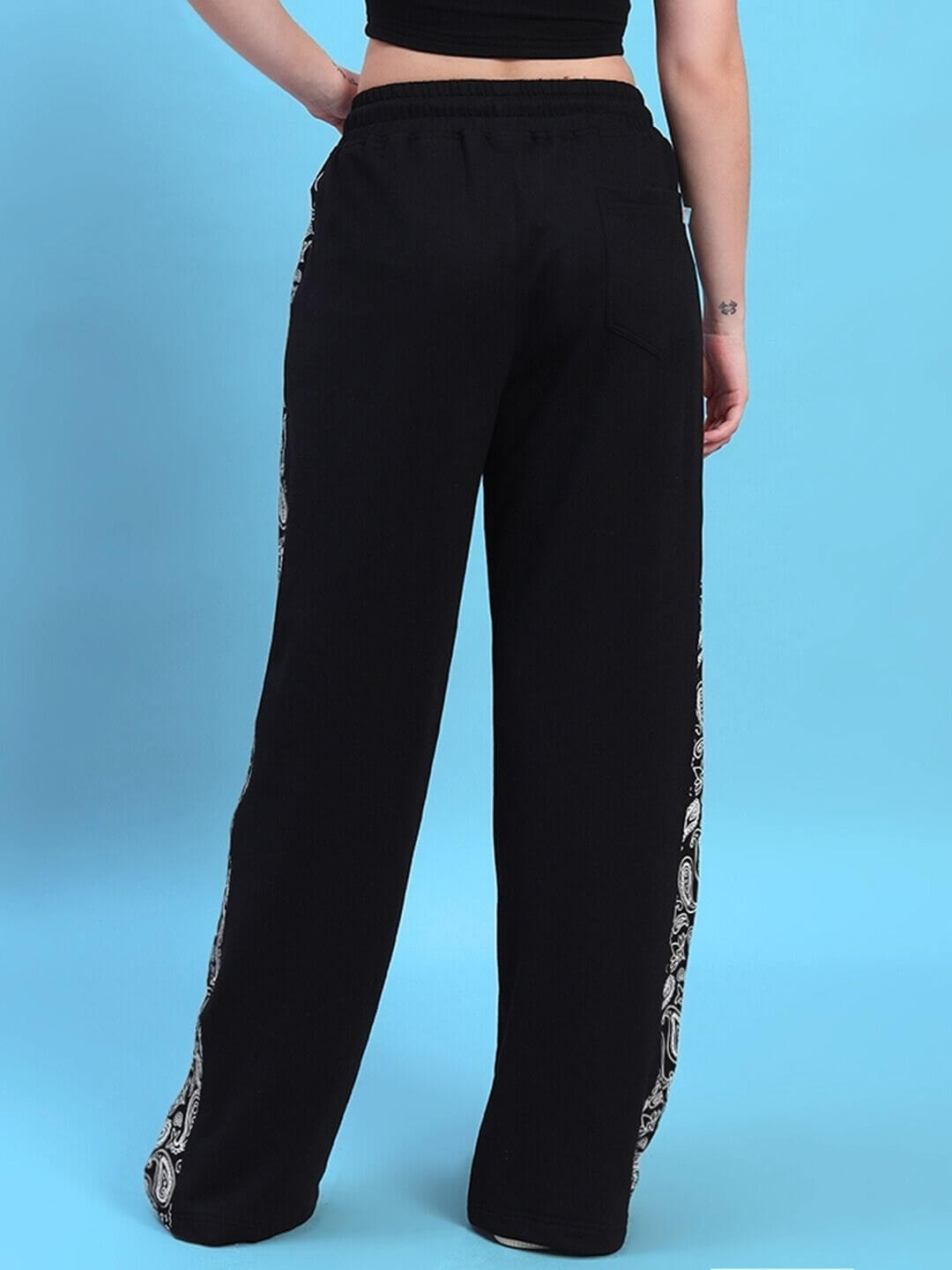 Back view of WOMEN'S SQUARO DESIGNER CO-ORD SET BLACK pants showcasing stylish design and comfortable fit.