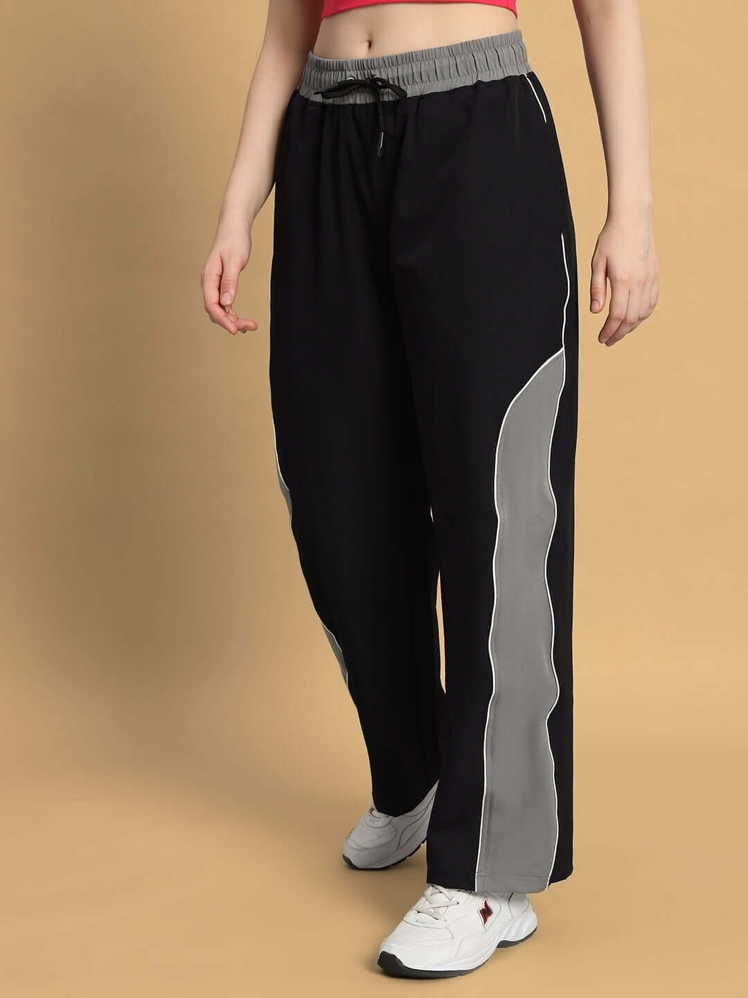 Women's Strom Relaxed Fit Cargo Pants in black-grey with custom fit option, highlighted by contrasting grey stripes and comfy waist.