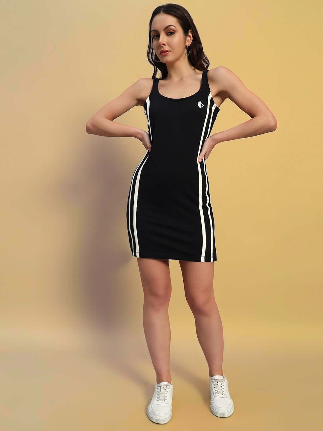 Model wearing Women's Supremacy Dress in black, made from polyester and spandex, featuring four-way Lycra, by Color By Colours.