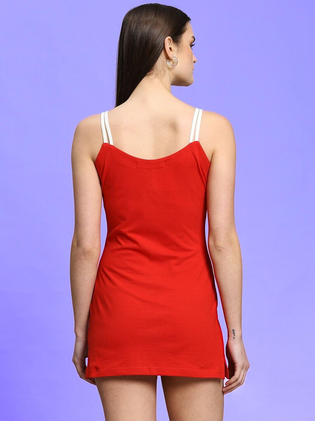 Rear view of a woman's sweet bralette dress in red, made of polyester and spandex, highlighting the fit and style against a purple background.
