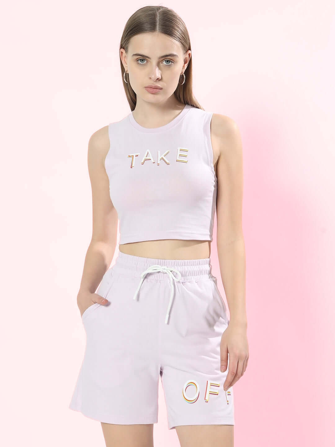 Woman wearing lilac co-ord set with 'TAKE OFF' print, premium cotton fabric, ideal for casual wear, made in India.