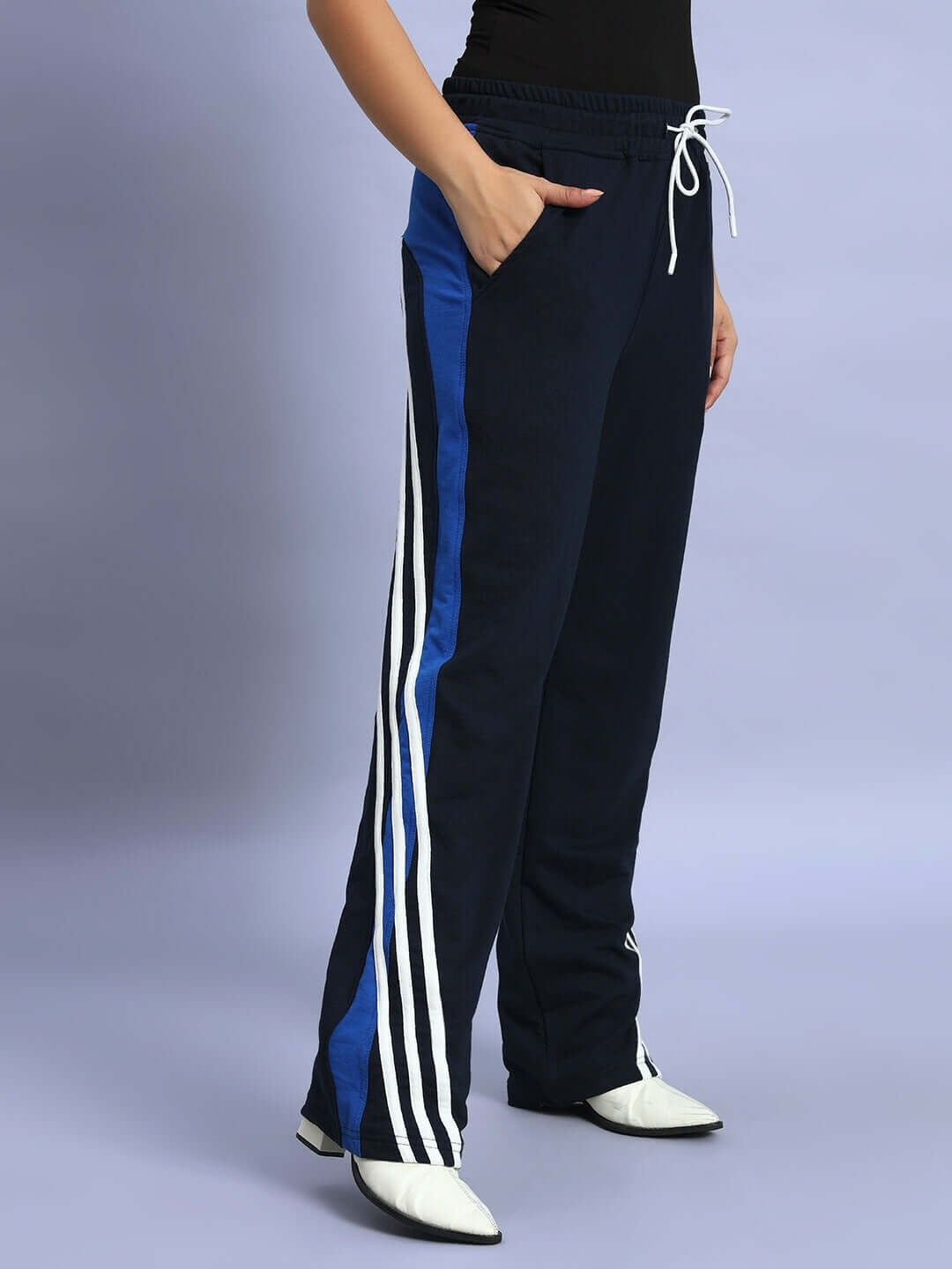 Women's navy blue relaxed-fit joggers by DUDS with side stripes, featuring a comfortable fit and customizable options.