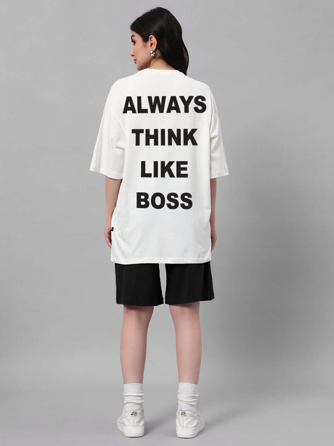 Back view of women's off white and black co-ord set with "Always Think Like Boss" text, made from premium cotton French terry lycra.