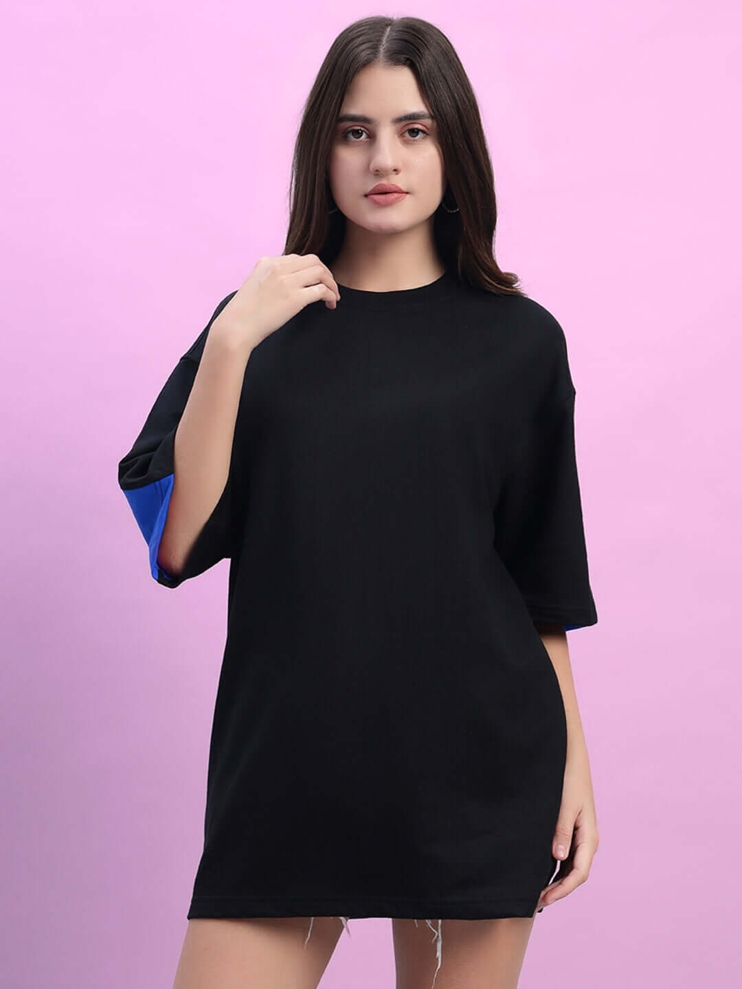 Women's Titan oversized black-blue t-shirt, premium cotton, 240 GSM, French terry, India-origin, styled against a pink background.