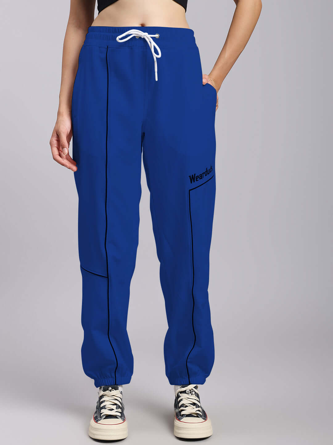 Women's blue relaxed fit joggers by DUDS, showcasing comfortable design with customizable fit option.