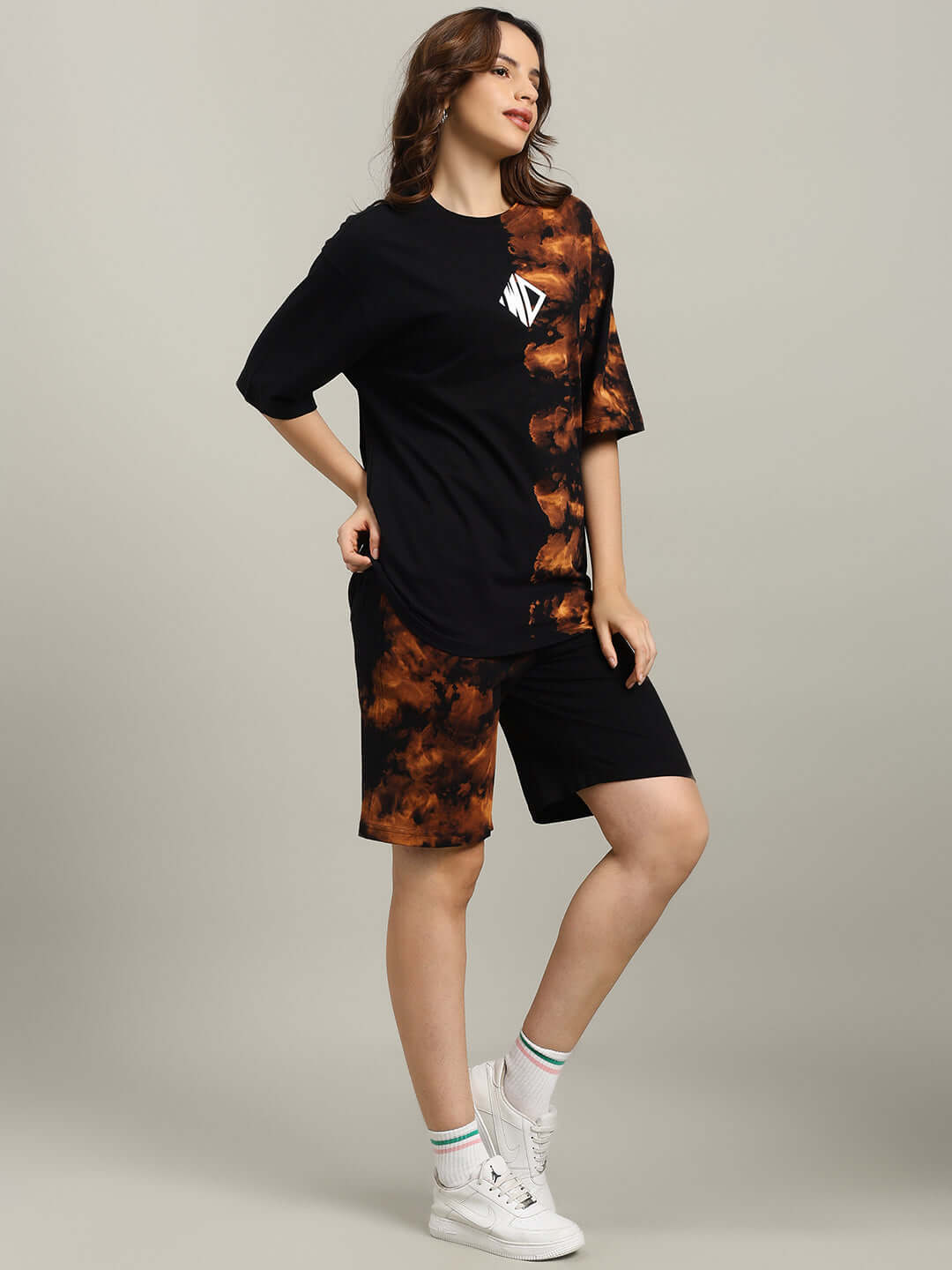 Model wearing WOMEN'S TRICKSTER TIE-DYE CO-ORD SET BLACK, featuring premium heavy gauge fabric, ideal for stylish casual wear.