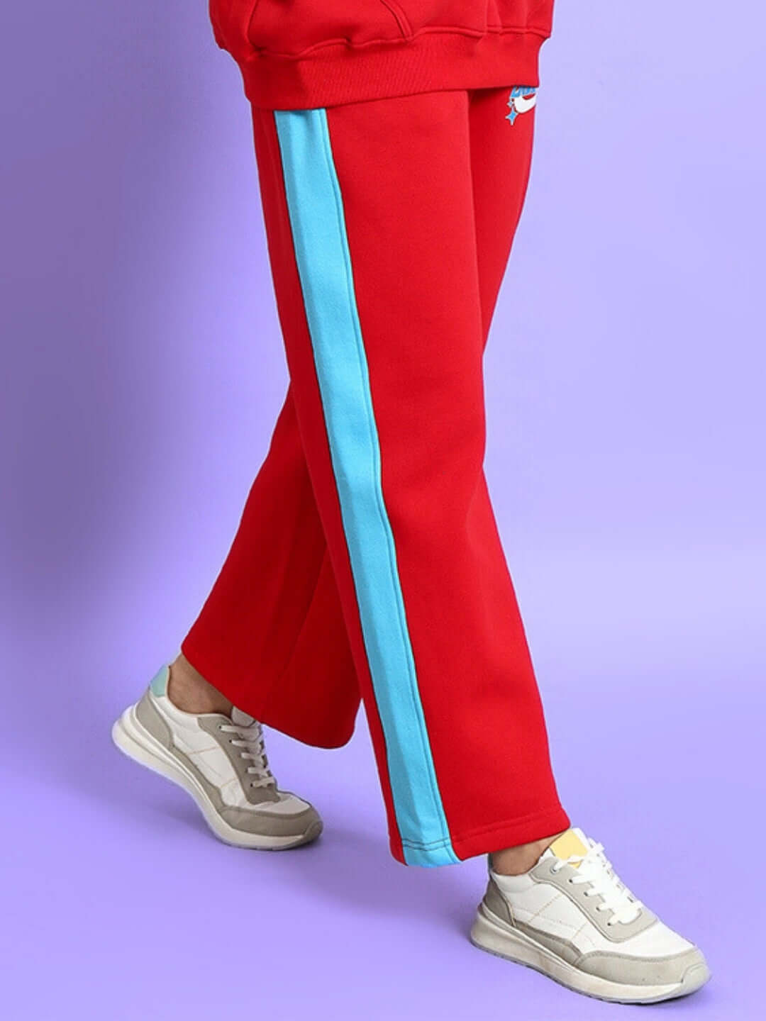 WOMEN TRUNKIT FLEECE COLORBLOCK CARGO PANT in red with blue stripe, featuring a relaxed fit and casual style.