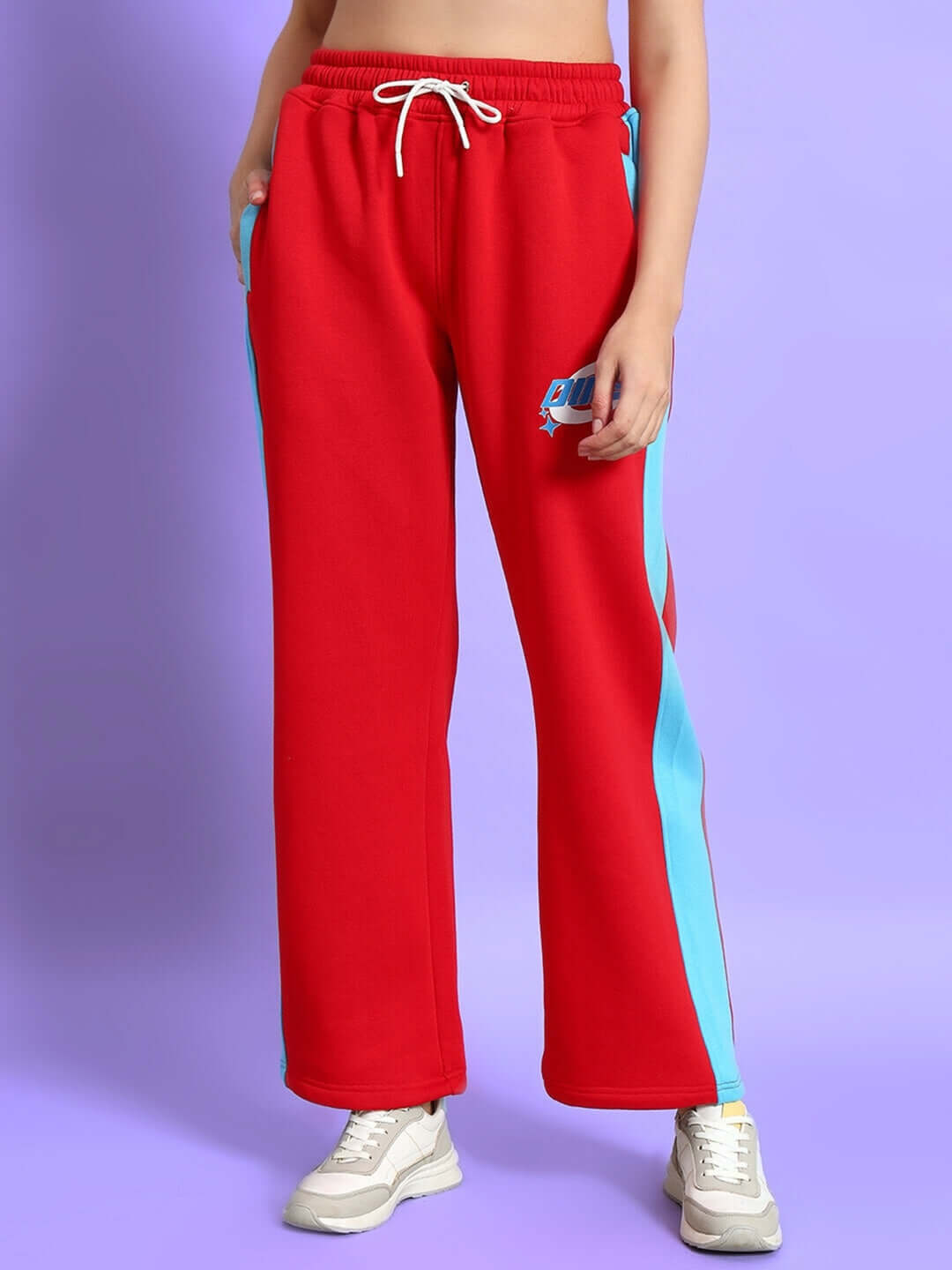 Woman wearing red and blue colorblock co-ord pants from Trunkit, showcasing comfort and style.