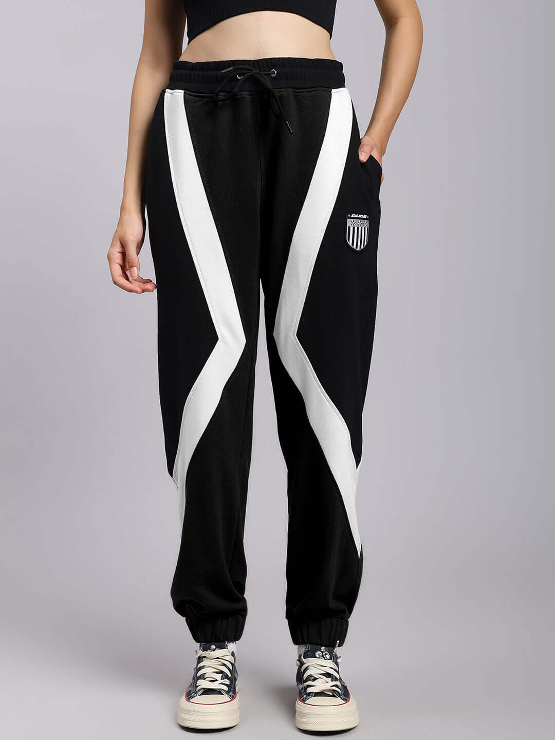 Women's ultra colorblock relaxed-fit joggers in black and white, featuring a modern design with customizable size options.
