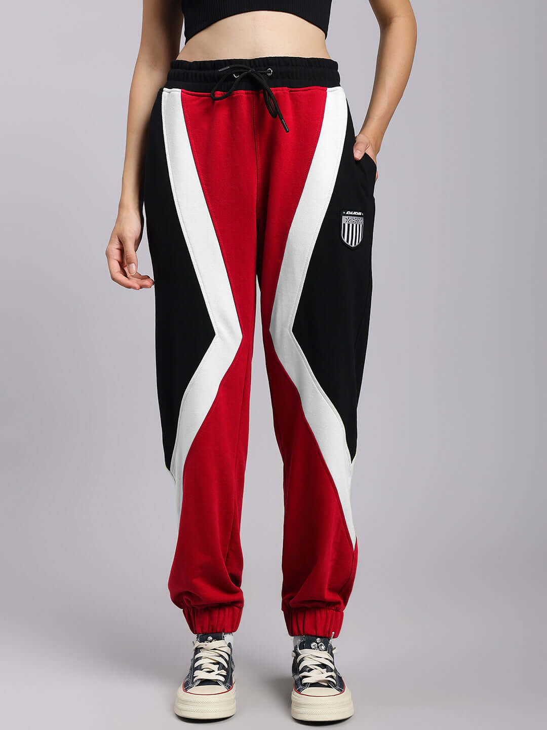 Women's Ultra Colorblock Relaxed-Fit Joggers in red and black with side pockets and drawstring waist, comfortable style.